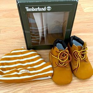 Infant crib size 2 Timberland boots with hat.